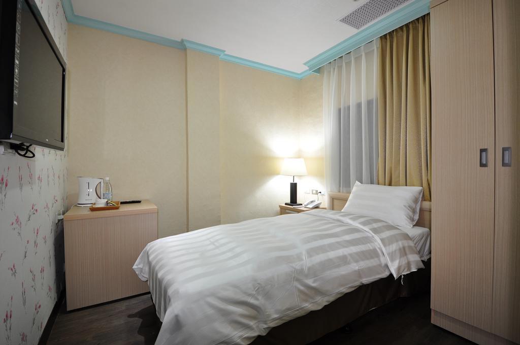 A Casa Hotel Taoyuan Ruang foto
