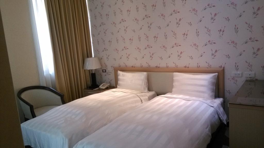 A Casa Hotel Taoyuan Ruang foto