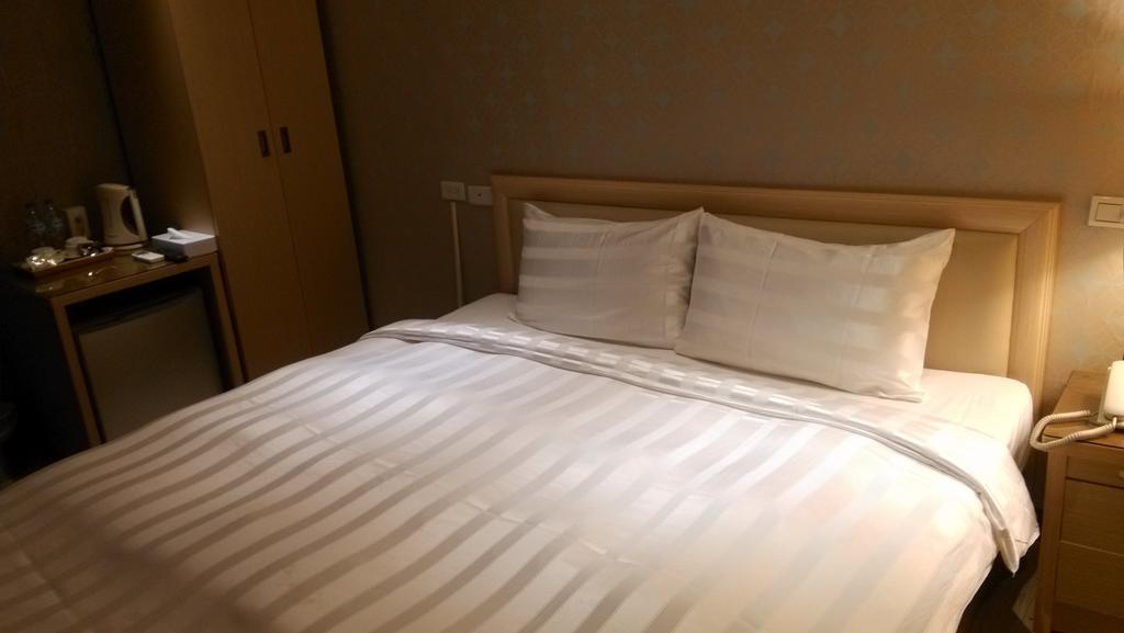 A Casa Hotel Taoyuan Bagian luar foto