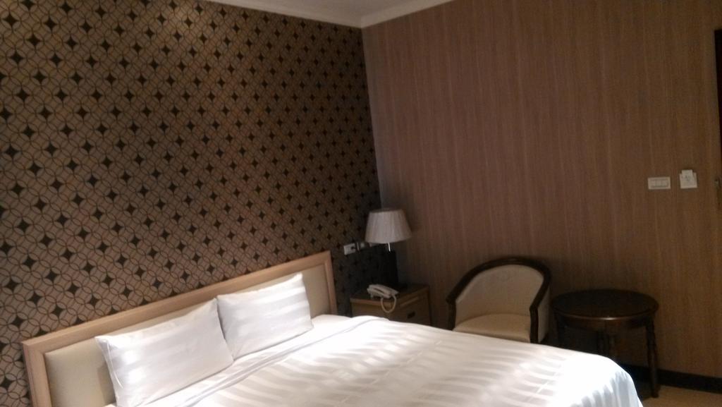 A Casa Hotel Taoyuan Ruang foto