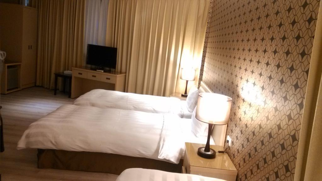 A Casa Hotel Taoyuan Ruang foto