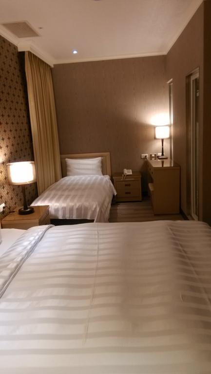 A Casa Hotel Taoyuan Ruang foto