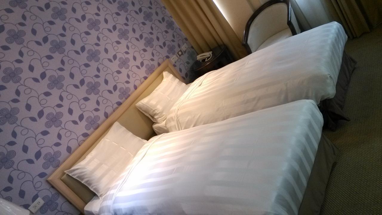 A Casa Hotel Taoyuan Bagian luar foto